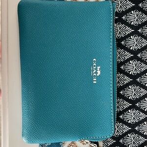Coach turquoise wristlet